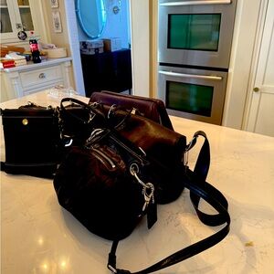 Group of 5 Coach Bags. They are all in great shape. Will sell separately as well